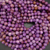 Vibrant purple phosphosiderite beads.