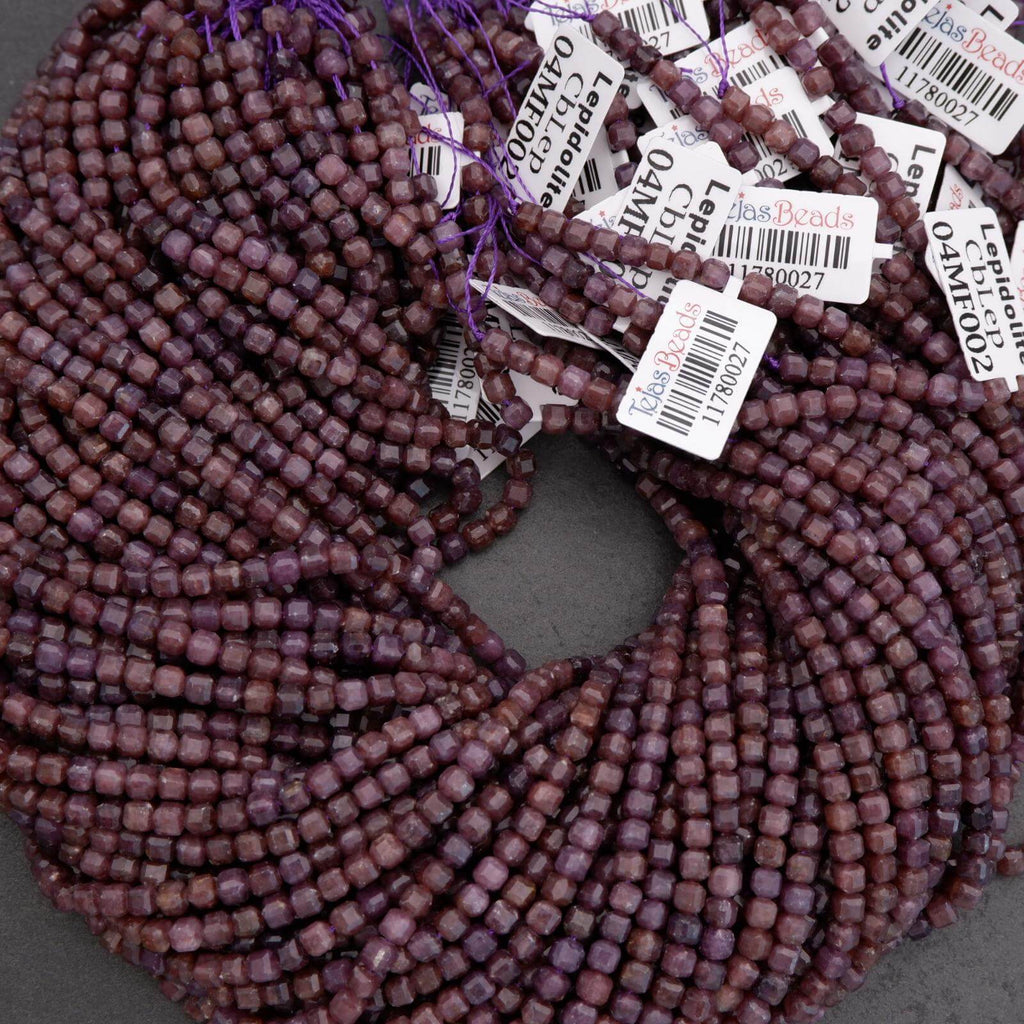 Purple beads with labels on a gray background