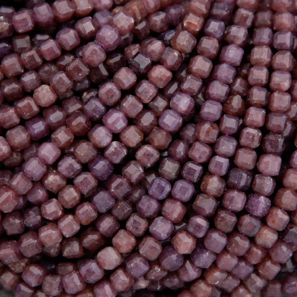 Close-up of purple beads arranged in a pattern