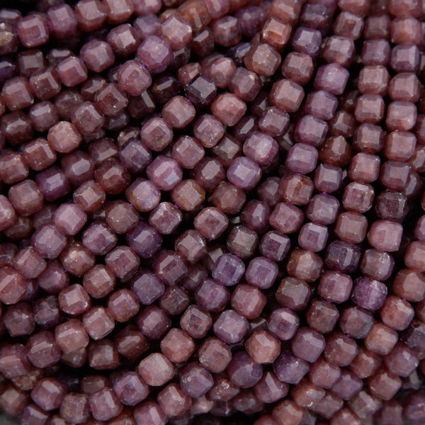 Close-up of purple beads arranged in a pattern