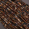 Close-up of multicolored beads on a gray background