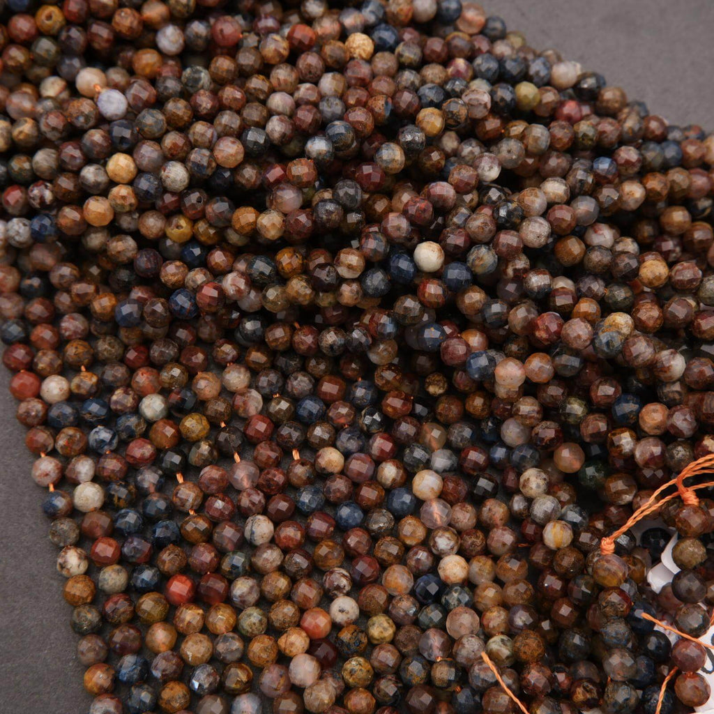 Close-up of multicolored beads on a gray background