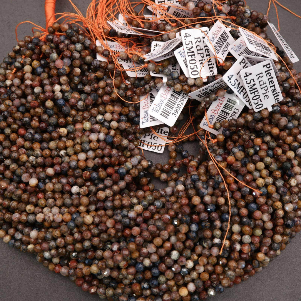 Multicolored beads with price tags on a gray background