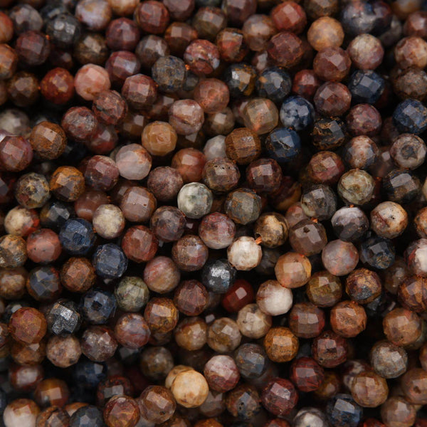 Close-up of multicolored gemstones with a focus on texture and color variation.