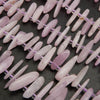Pink kunzite stick shape beads.