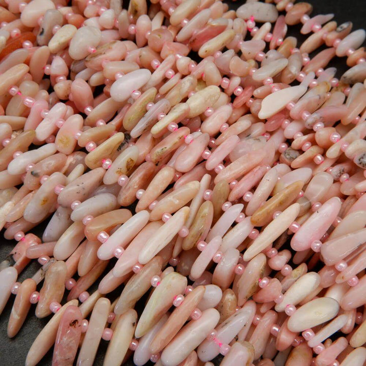 Pink opal stick shape beads.