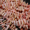 Pink opal stick shape beads.