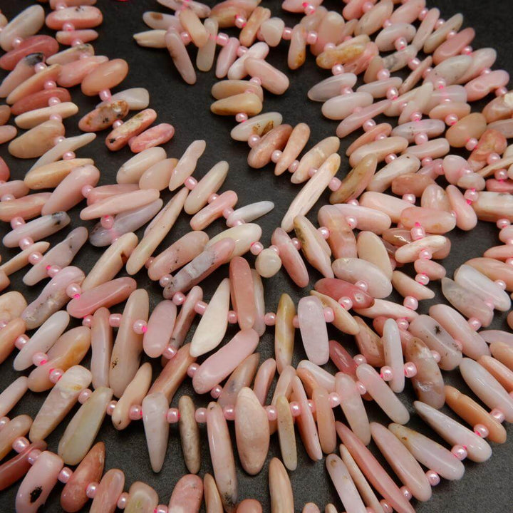 Pink opal stick shape beads.