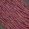 Natural pink ruby gemstone beads with delicate faceting, offering warm blush hues and organic color variation throughout.