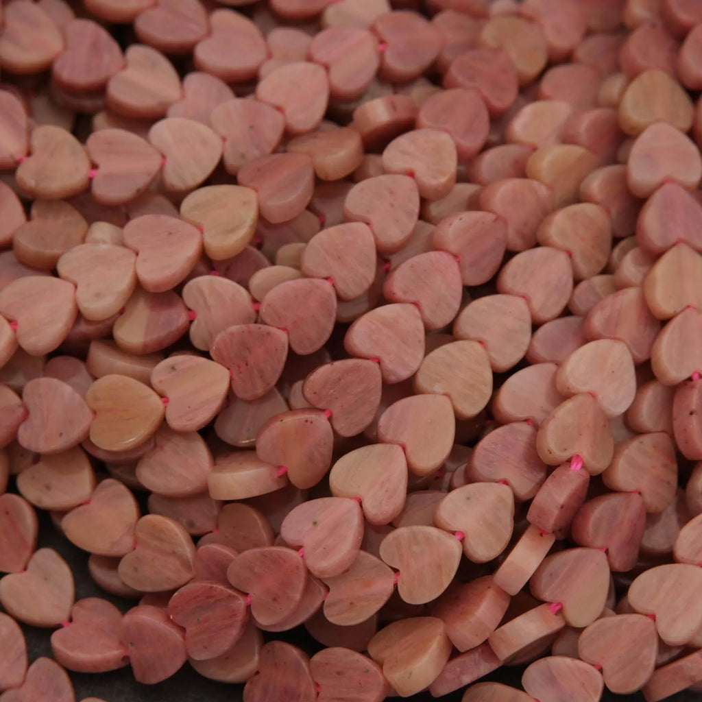 Close-up of pink heart-shaped beads.