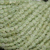 Close-up of translucent green beads