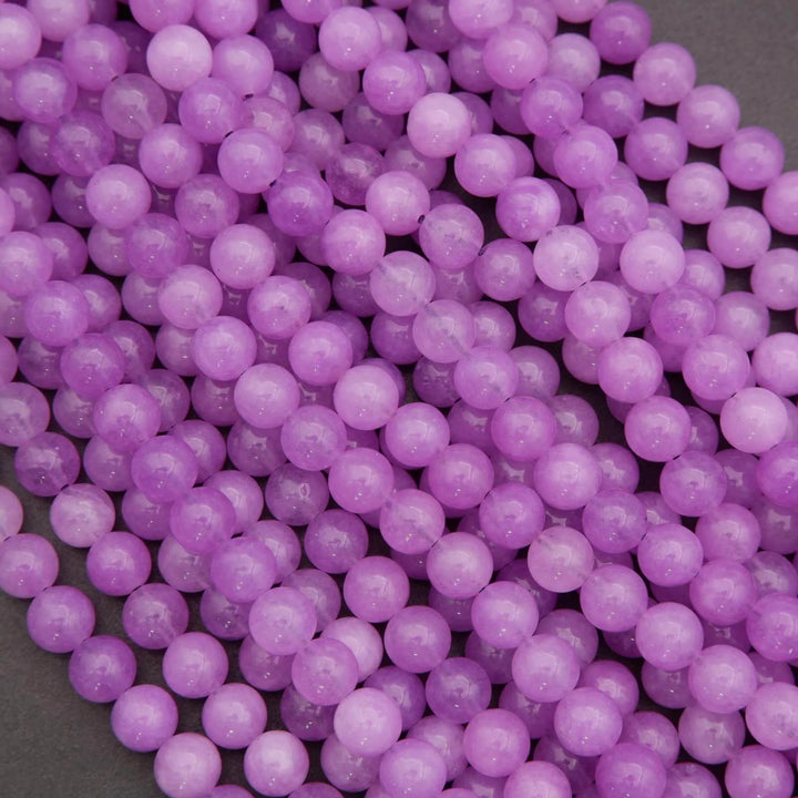 Close-up of purple beads on a dark background