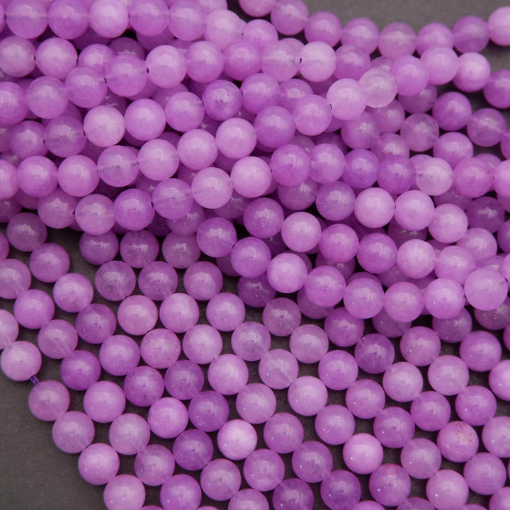 Close-up of purple beads on a dark background