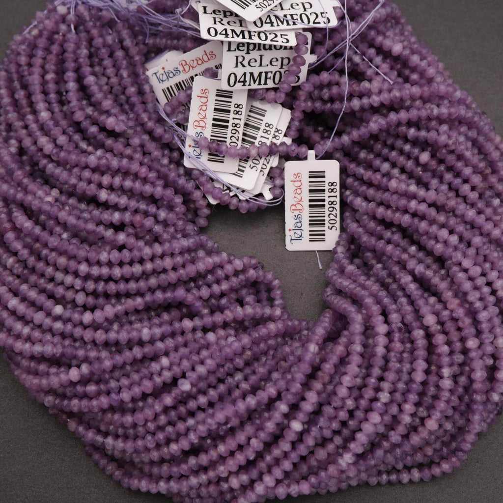 Purple beads with labels on a gray background
