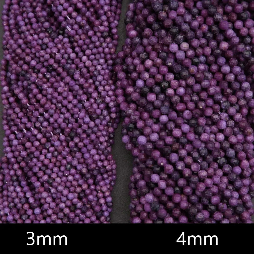 Close-up of purple beads labeled '3mm' and '4mm' on a black background