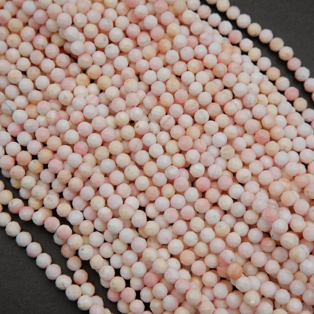 Light pink faceted round beads.