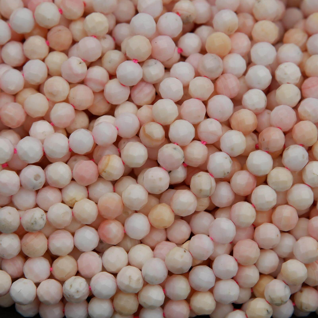 Light pink faceted round beads.