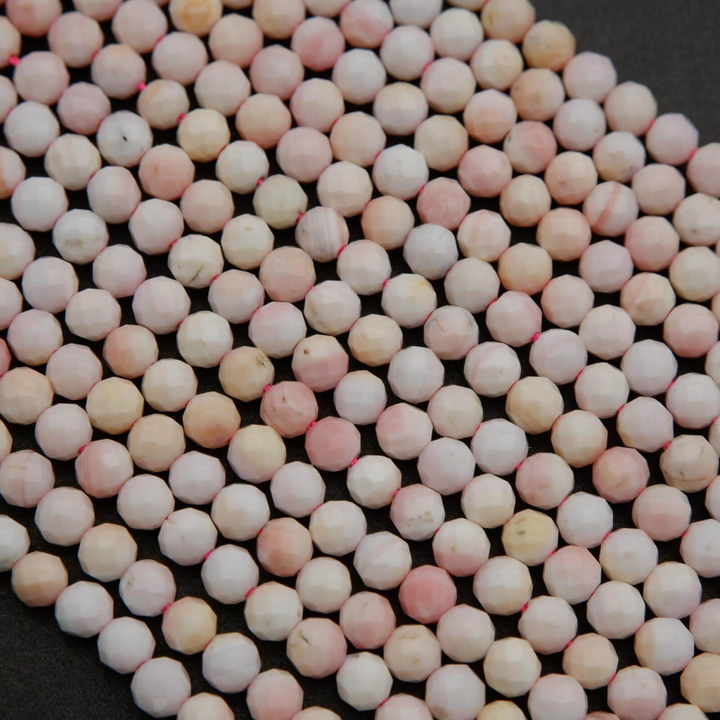 Light pink faceted round beads.