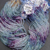 Multicolored yarn skein with labels on a gray background