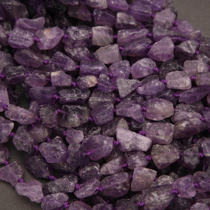 Close-up of purple crystal stones on a dark background