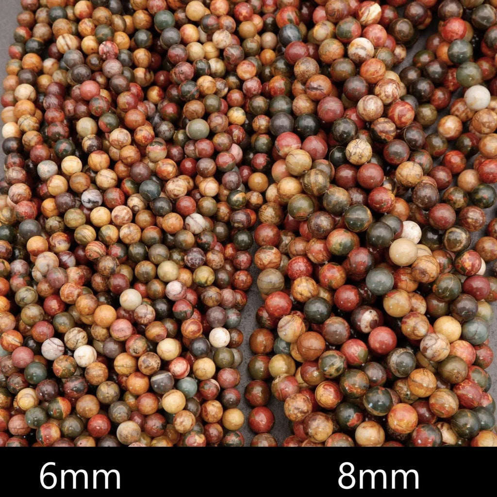 Close-up of multicolored beads with size labels '6mm' and '8mm'.