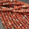 Mixed red jasper beads.