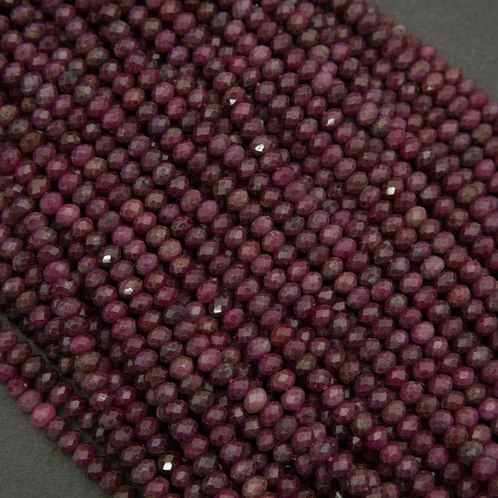 Faceted ruby beads with earthy inclusions