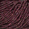 Faceted red ruby beads with natural color variation
