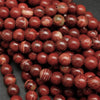 Red snakeskin jasper beads.