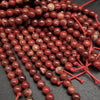Red snakeskin jasper beads.