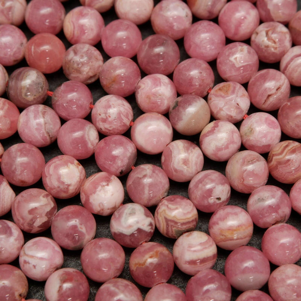 Striped white and pink rhodochrosite beads.