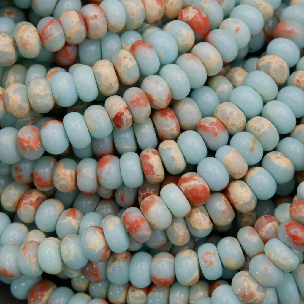 Soothing blues, creams, and warm earth tones with natural marbled patterns.