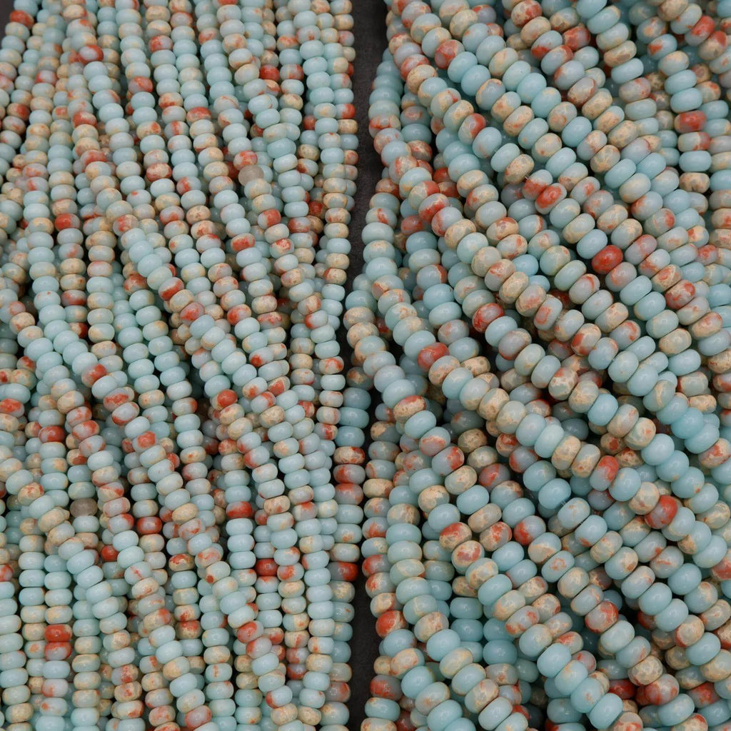 Soothing blues, creams, and warm earth tones with natural marbled patterns.