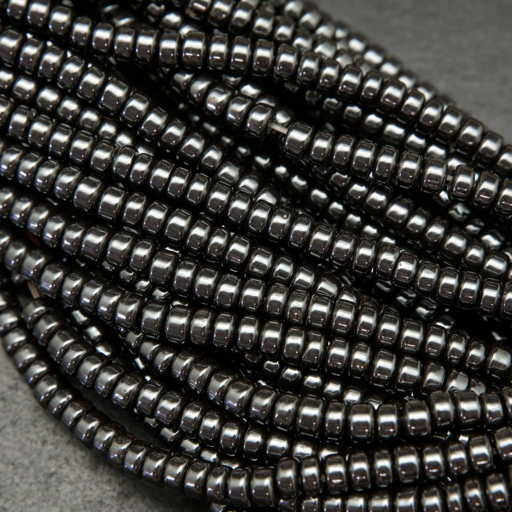 Hematite rondelle disk beads.