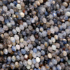 Close-up of small, faceted gemstones in various colors.