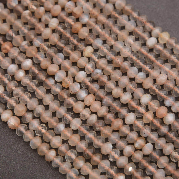 Close-up of transparent beads on a dark background