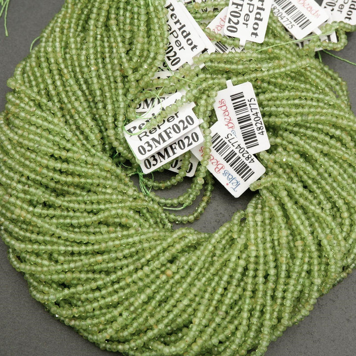 Yellow-green translucent rondelle shape faceted beads.