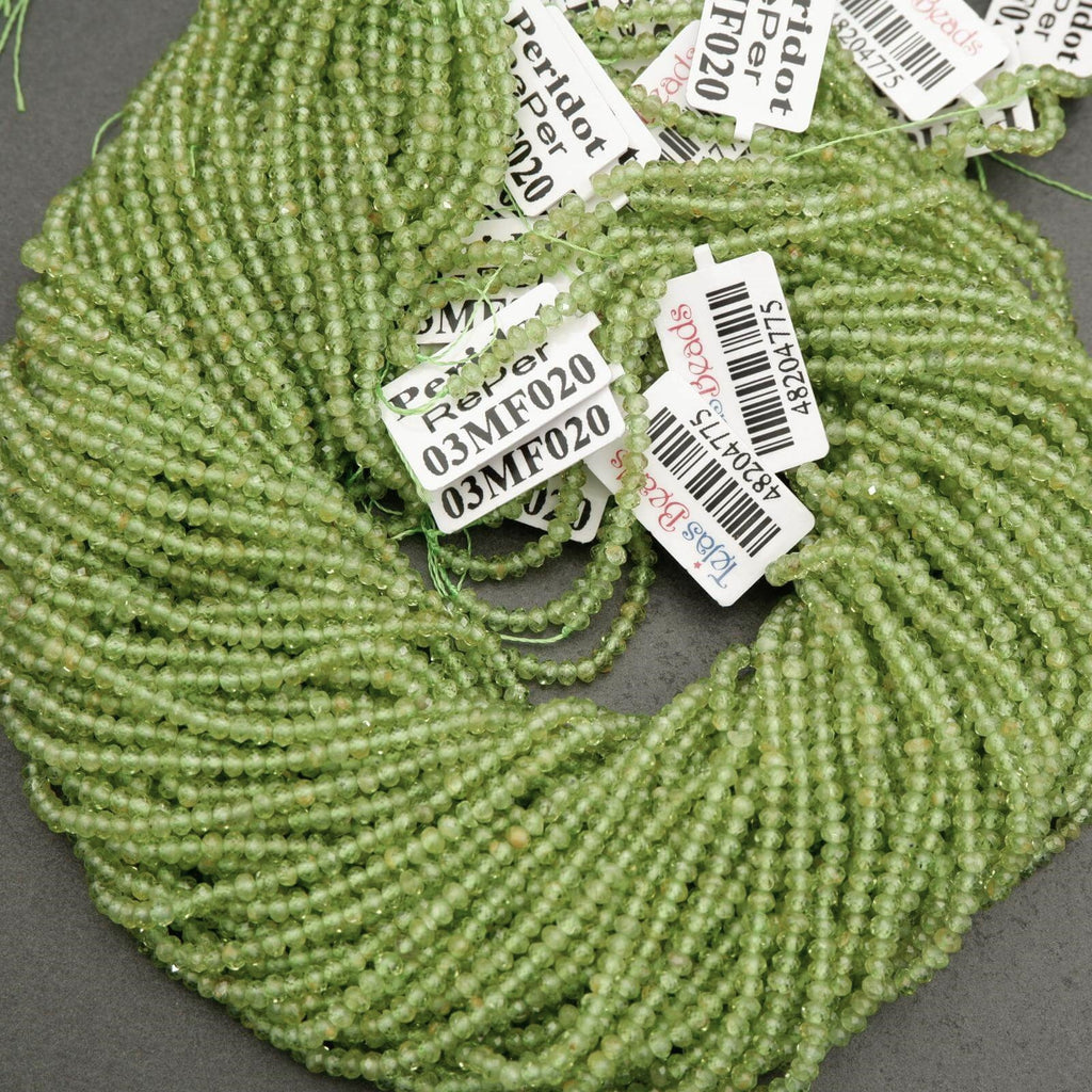 Yellow-green translucent rondelle shape faceted beads.