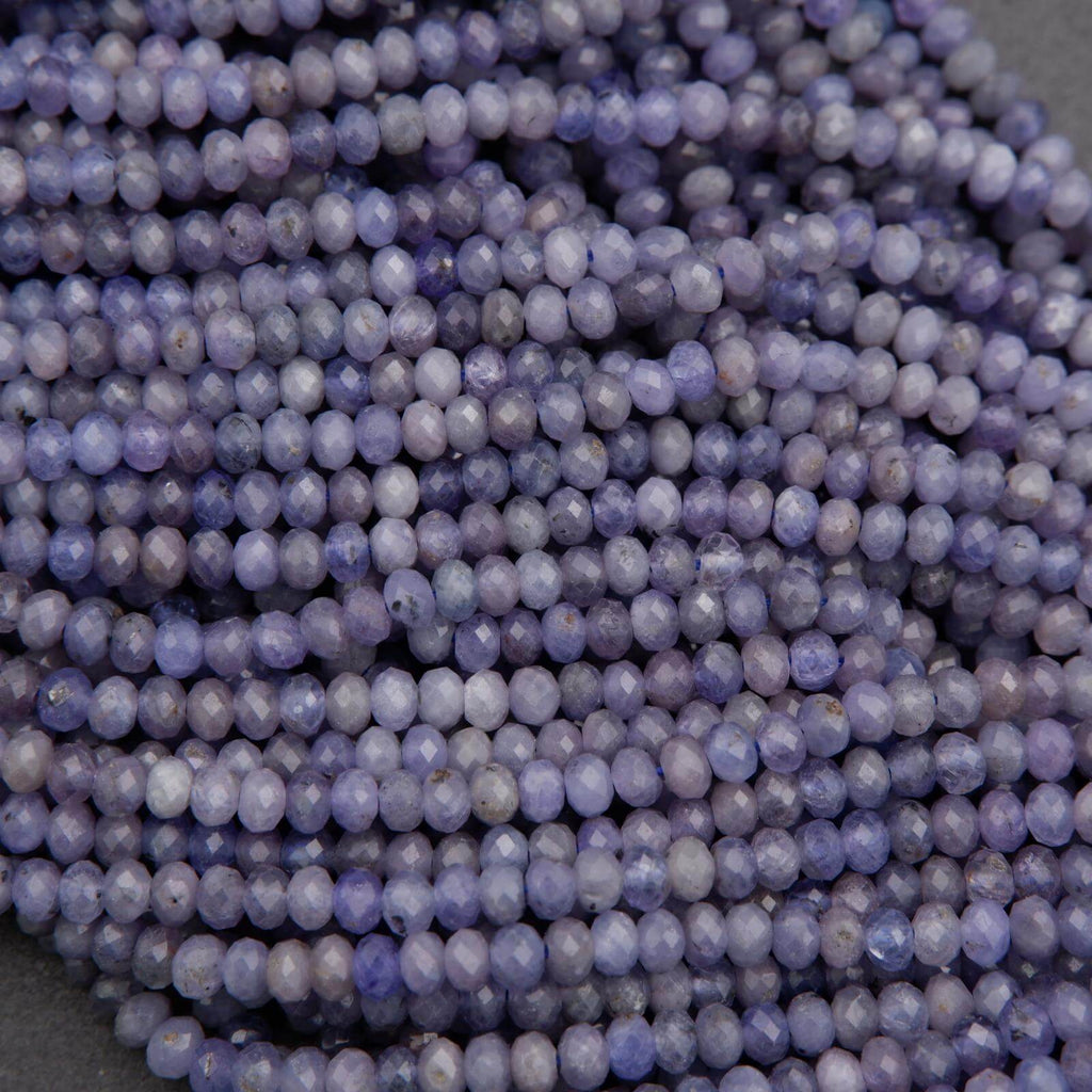 Close-up of purple beads on a dark background
