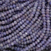 Close-up of purple beads with a soft focus