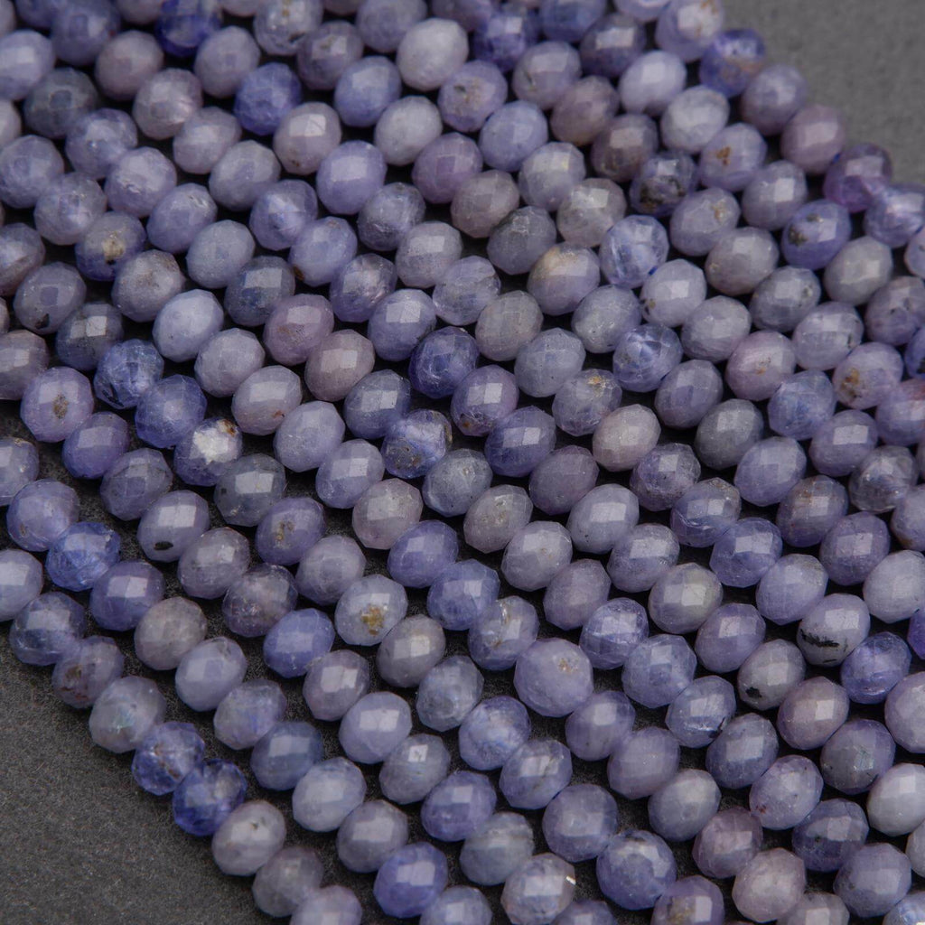 Close-up of purple beads on a dark background