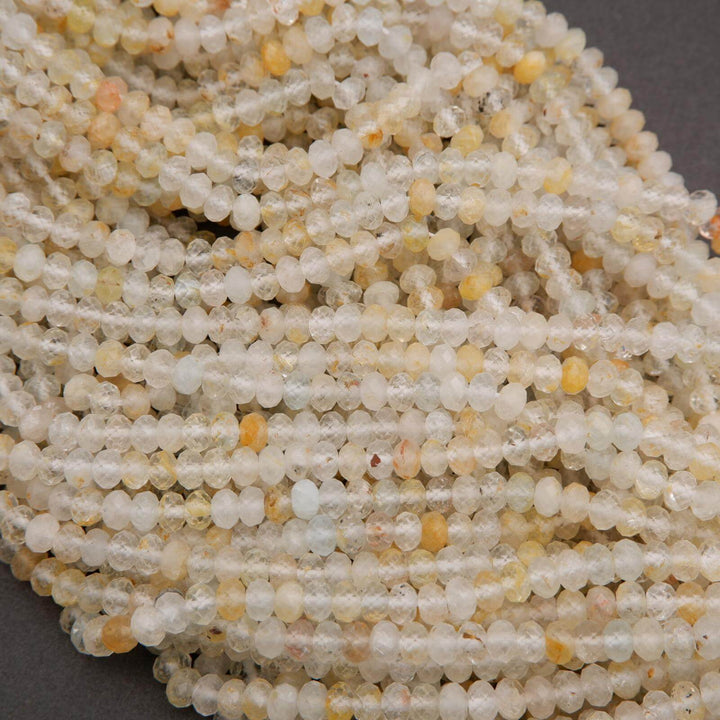 Rondelle Topaz Beads with faceted finish yellow inclusions.