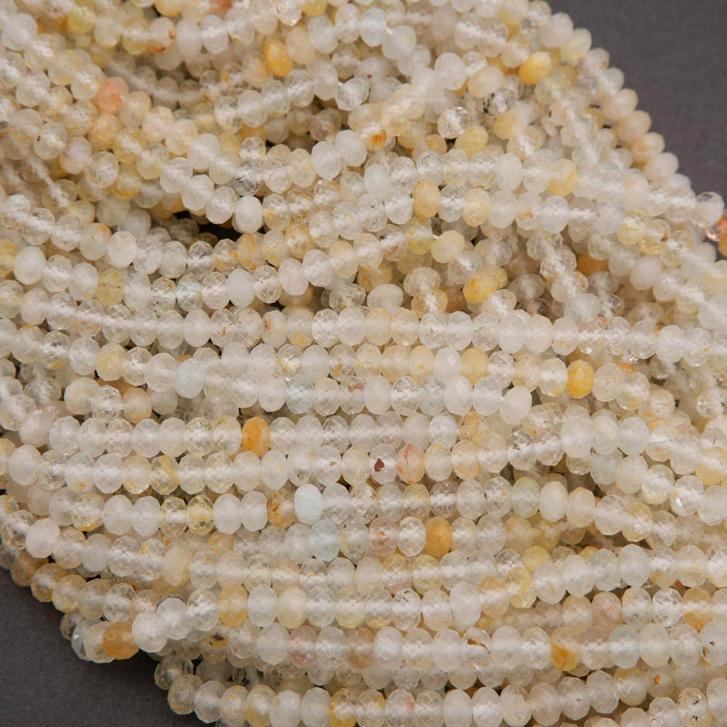 Rondelle Topaz Beads with faceted finish yellow inclusions.