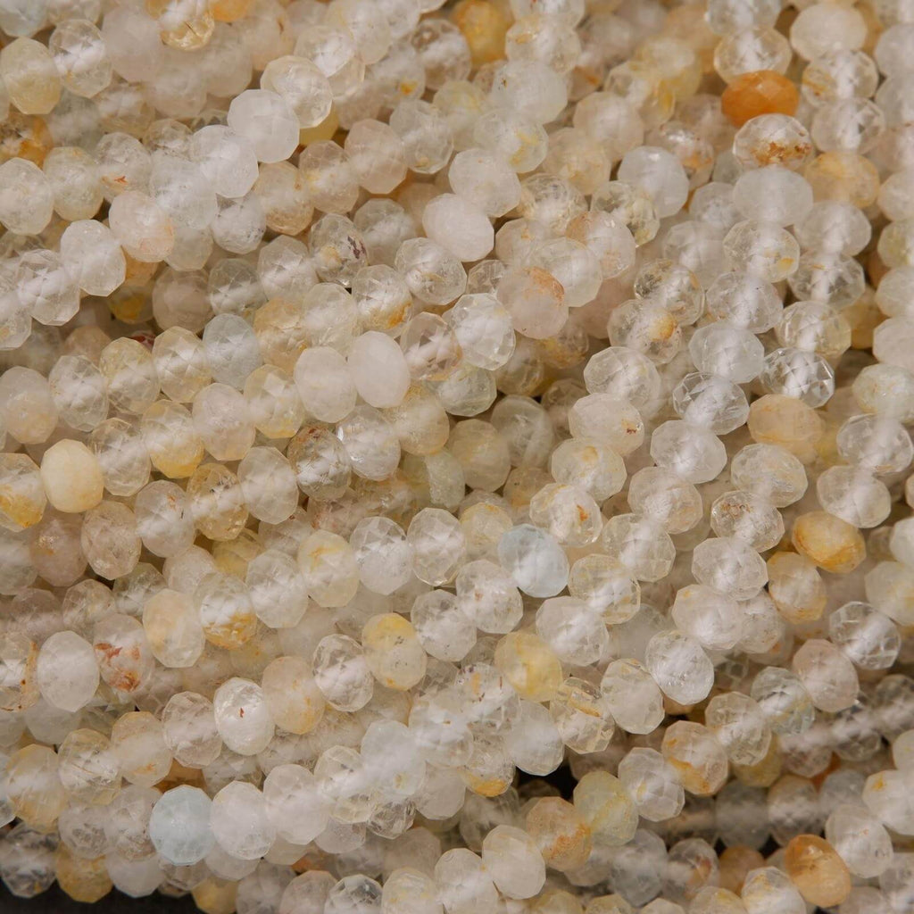 Rondelle Topaz Beads with faceted finish yellow inclusions.