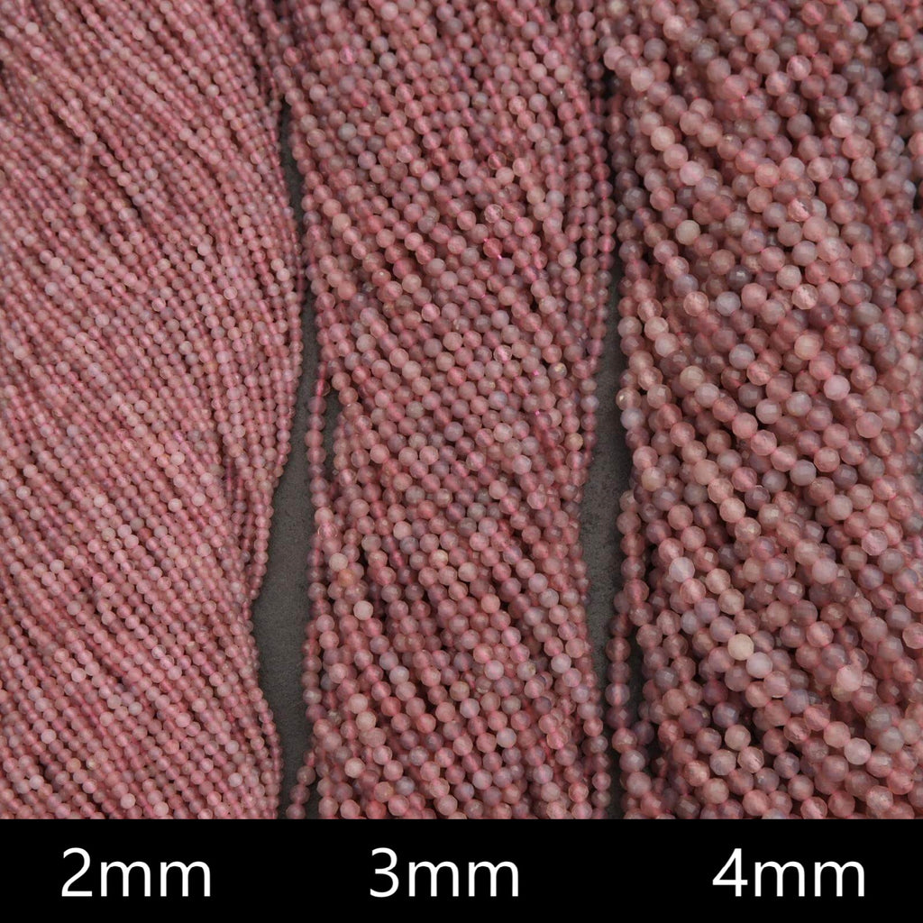 Close-up of pink beads with size labels '2mm', '3mm', and '4mm' on a dark background.