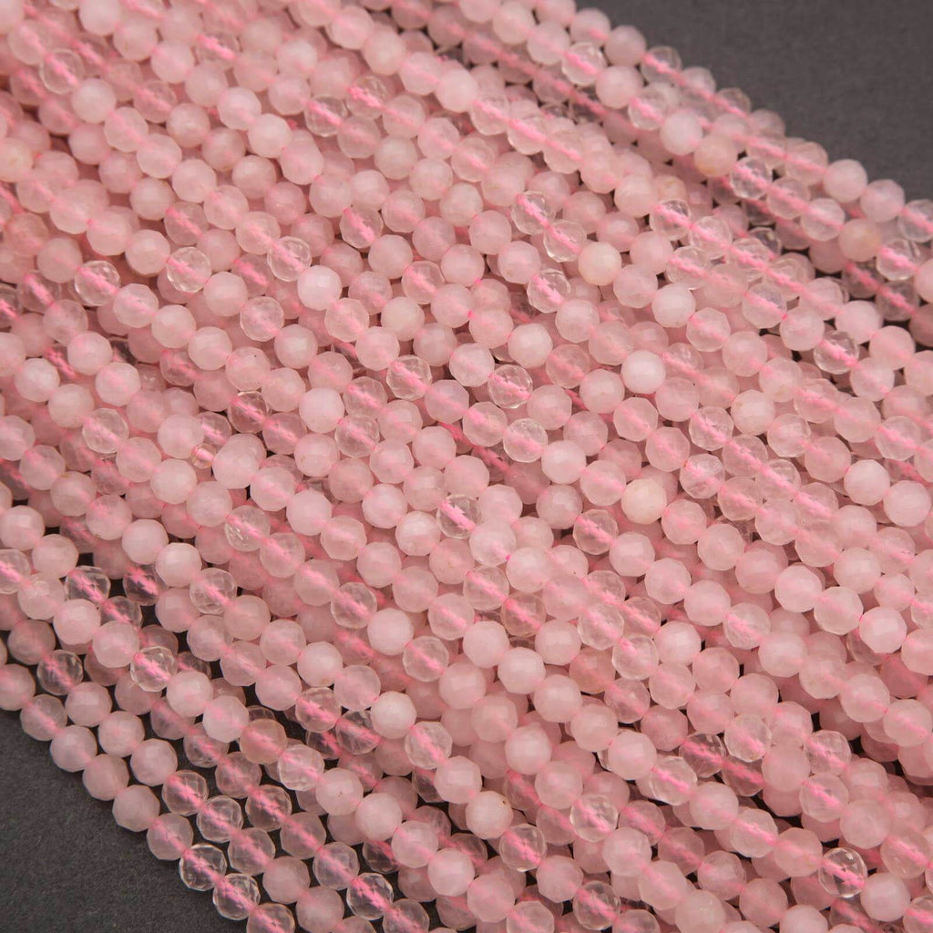 Close-up of pink beads on a dark background