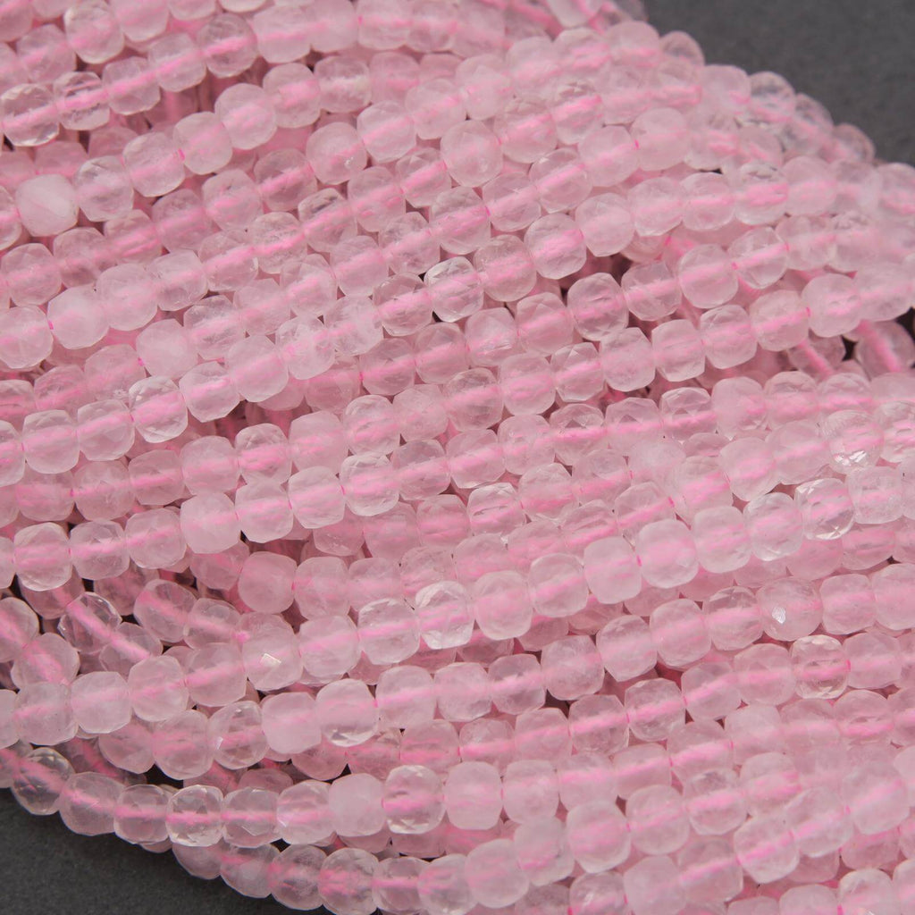 Close-up of pink beads on a string