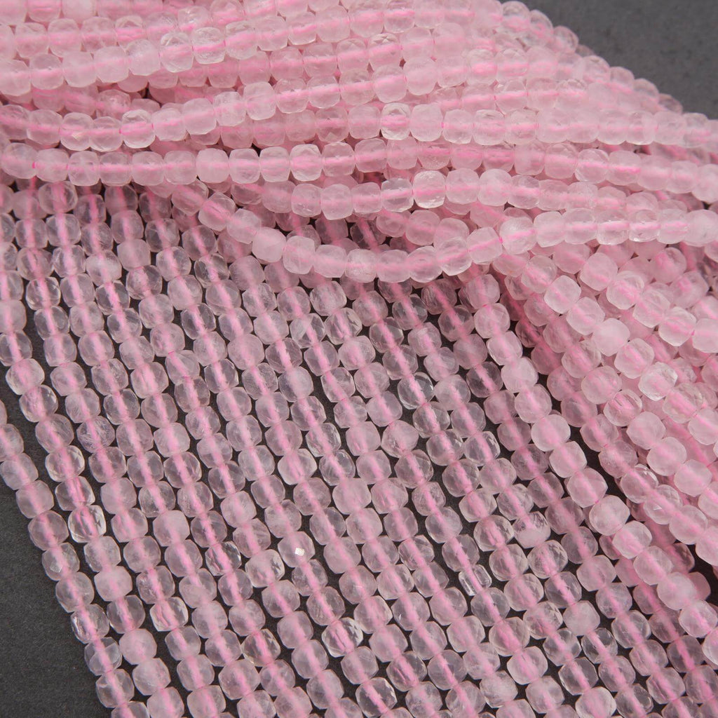 Close-up of pink beads on a dark background
