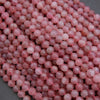 Close-up of pink beads on a gray background