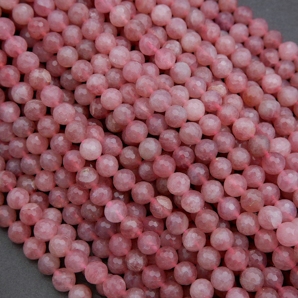 Close-up of pink beads on a gray background